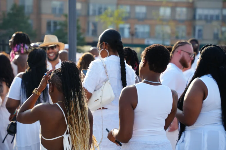 Attendees enjoying the all-white yacht party before the Hair Education Summit